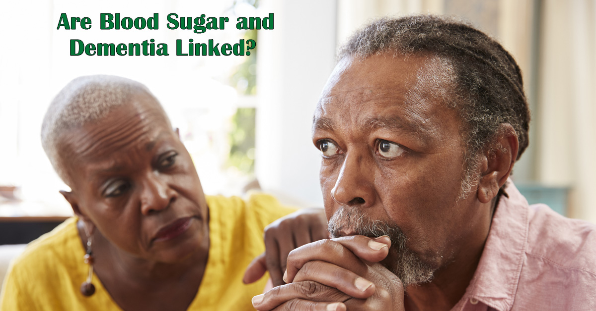 Is There a Link Between Blood Sugar and Dementia? Picture of a black female looking concerned about a black male who looks lost in thought.